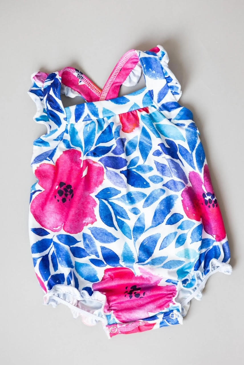 Vivid Garden Ruffle Cross Back Romper